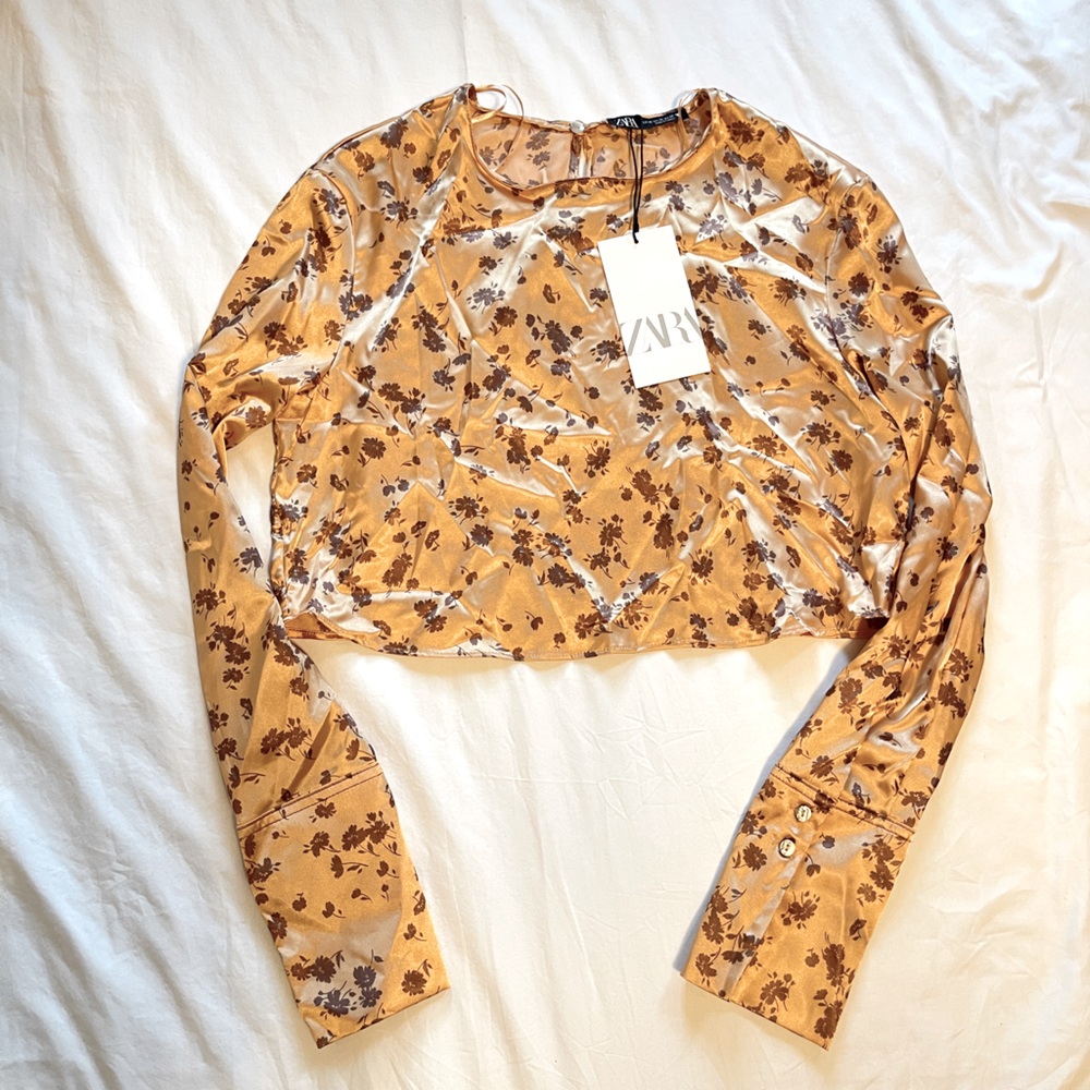 Zara Women's Tan Floral Blouse. This color is more like a tan peach color.